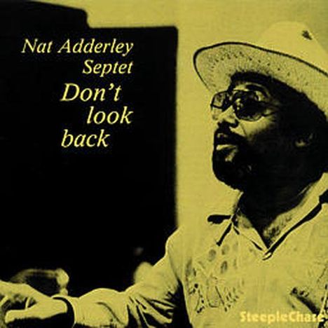 "Nat Adderley Septet Don’t look back". Ein Mann mit Hut und Brille, hebt eine Hand, gelber Hintergrund.