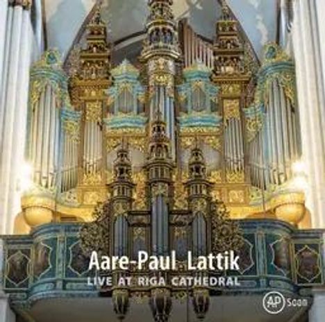 "Aare-Paul Lattik Live at Riga Cathedral." Prächtige Orgel mit aufwendigen goldenen Verzierungen in einer Kathedrale.