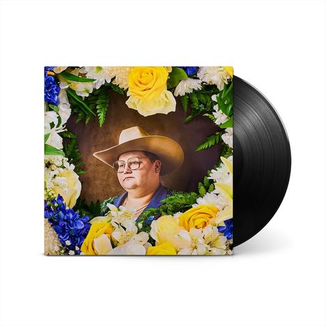 Das Bild zeigt ein Albumcover mit einem Mann im Cowboyhut, umrahmt von gelben und blauen Blumen. Rechts eine schwarze Schallplatte.