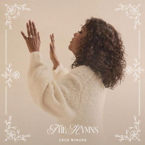 "The Hymns" und "CeCe Winans". Eine Frau in weißem Pullover erhebt ihre Hände, umgeben von floralen Ornamenten.