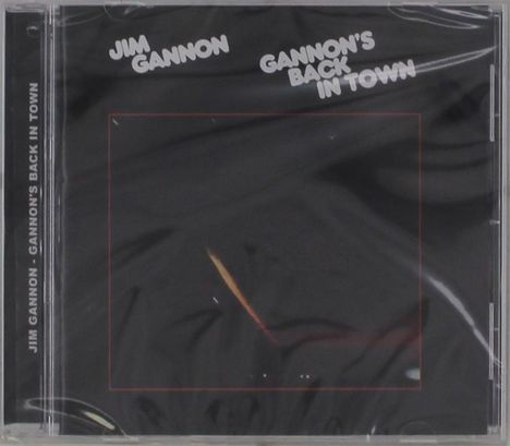 "Jim Gannon - Gannon's Back in Town" steht in weißer Schrift auf dunklem Hintergrund, minimalistische Gestaltung.