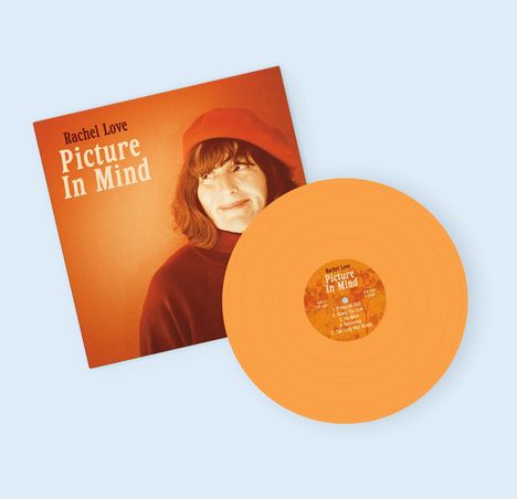 Albumcover "Rachel Love - Picture In Mind" mit oranger Vinyl, Frau mit rotem Hut lächelt.