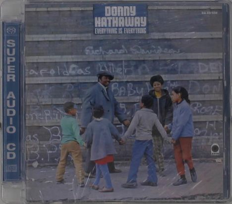 "Super Audio CD", "Donny Hathaway", "Everything Is Everything". Menschen halten sich vor einer Mauer an den Händen.