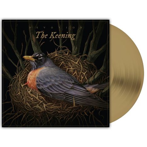 "DEVOTION The Keening". Ein Vogel sitzt in einem Nest, umgeben von Zweigen. Vinyl in Goldfarbe.