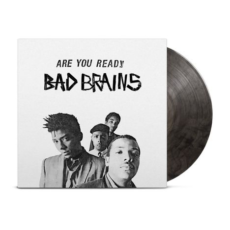 Text: "ARE YOU READY? BAD BRAINS." Darunter vier Männer in Schwarz-Weiß, Hintergrund schlicht, daneben eine Schallplatte.