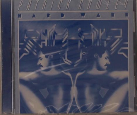 PATRICK COWLEY, HARDWARE. Zwei Männer in Blau, symmetrisch, mit abstrakten Dekorationen.