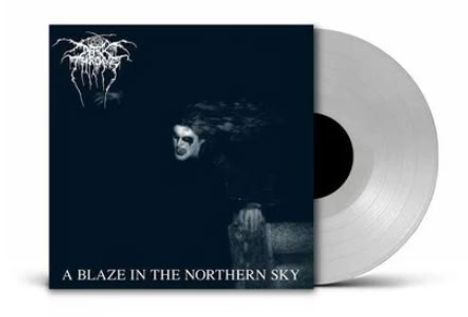 Oben ein kaum lesbares Logo, unten "A Blaze in the Northern Sky". Dunkles Cover mit unscharfer, geisterhafter Gestalt.