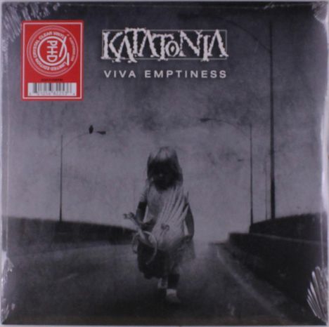 Texte: "Katatonia", "Viva Emptiness". Ein Kind geht alleine auf einer leeren Straße.