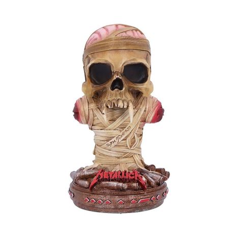 Text: "Metallica". Eine dekorative Büste eines Schädels, umwickelt mit Bändern, auf einem verzierten Sockel.