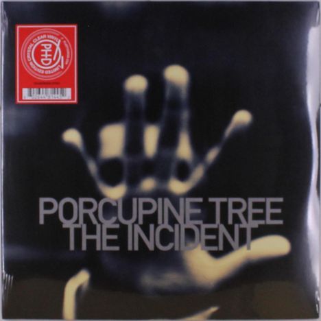 „PORCUPINE TREE THE INCIDENT“, ein verschwommenes Handmotiv auf dunklem Hintergrund, oben links rotes Logo.
