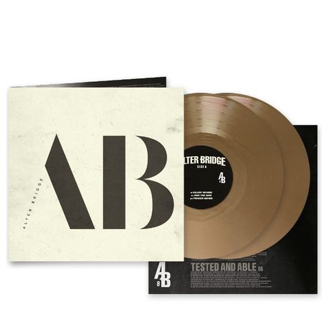 "ALTER BRIDGE" und "TESTED AND ABLE" sind sichtbar. Ein schlichtes Cover mit großen "AB"-Initialen und zwei goldenen Schallplatten.