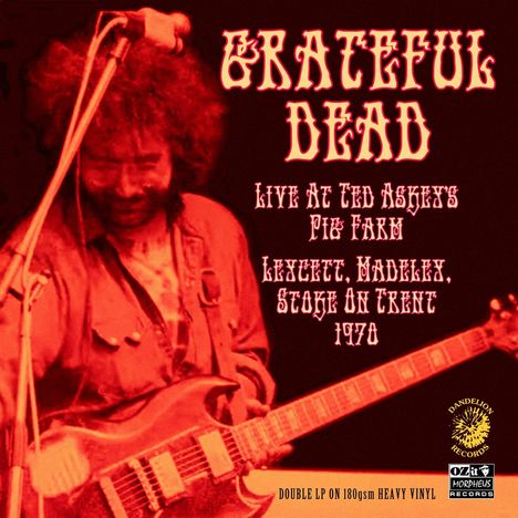 Text: "Grateful Dead Live at Ted Askey's Pig Farm, Leycett, Madeley, Stoke on Trent 1970. Double LP on 180gsm Heavy Vinyl."  
Ein Gitarrist spielt, warmes, rotes Farbschema.