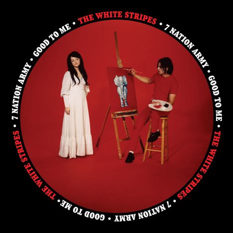 "The White Stripes", "7 Nation Army", "Good to Me". Eine Frau in Weiß, ein Mann in Rot malt einen Elefanten.