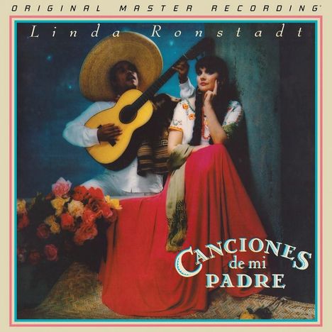 „Canciones de mi Padre“ und „Linda Ronstadt“: Frau in bunter Tracht sitzt, Musiker mit Gitarre und großem Hut daneben.