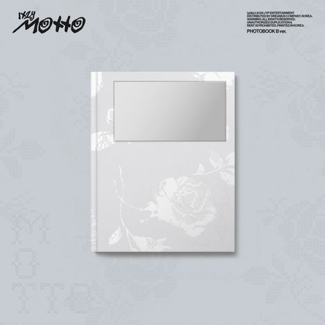 "PHOTBOOK B.ver." steht oben rechts, darunter florales Muster in Weiß auf hellem Hintergrund.