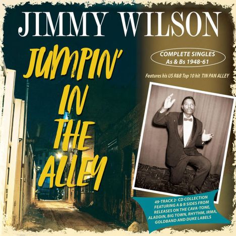 "JIMMY WILSON. JUMPIN' IN THE ALLEY. COMPLETE SINGLES As & Bs 1948-61. Foto eines Mannes in Anzug in einer Gasse."