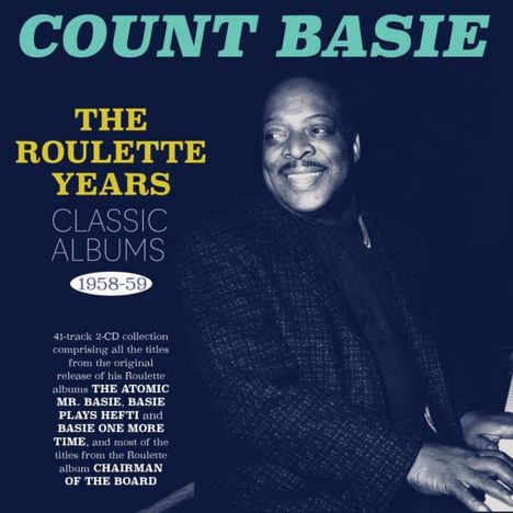 COUNT BASIE, THE ROULETTE YEARS, CLASSIC ALBUMS 1958-59. Schwarz-Weiß-Foto eines lächelnden Mannes in einem Anzug.
