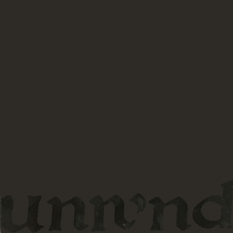 Der Text "unn'nd" ist in schwarzer Frakturschrift auf dunkelgrauem Hintergrund zu sehen.