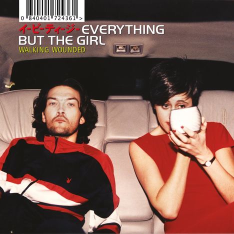 Text: "EVERYTHING BUT THE GIRL, WALKING WOUNDED". Zwei Personen auf einem Autositz, eine Person mit Tasse.