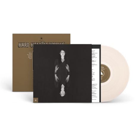 "Hard Hitter Woman" in verschnörkelter Schrift. Cover zeigt eine Frau in Schwarz mit gespiegeltem Abbild. Weiße Vinyl-Schallplatte.