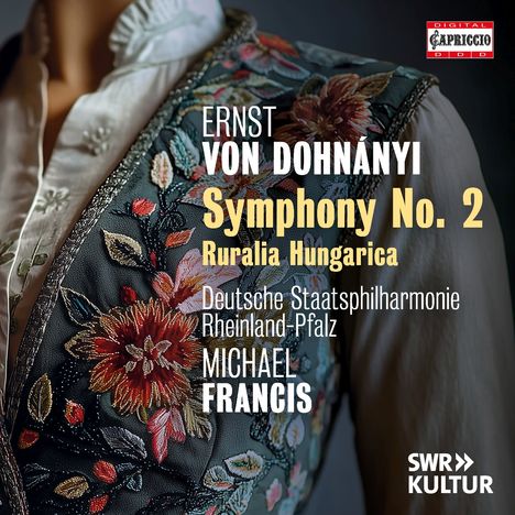 "ERNST VON DOHNÁNYI Symphony No. 2. Dunkle Weste mit bunten Blumenstickereien über weißem Hemd."