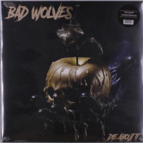 Text: "BAD WOLVES" oben und "DIE ABOUT IT" unten.  
Schädel mit goldener Flüssigkeit auf schwarzer Hand.