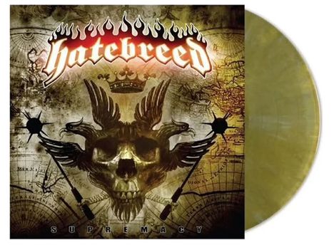 Der Text lautet "hatebreed" oben und "Supremacy" unten. Ein Totenkopf mit Flügeln und eine Krone vor Kartenmotiven.