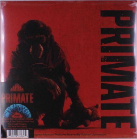 „PRIMATE“ in großen Buchstaben, darunter eine Silhouette eines Affen vor rotem Hintergrund.