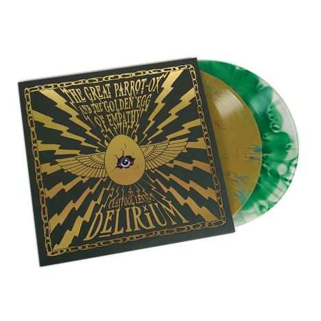 "The Great Parrot-Ox and The Golden Egg of Empathy" steht in Gold auf einem Cover mit goldenem Ei und Flügeln.