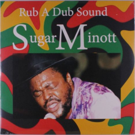 Text: "Rub A Dub Sound Sugar Minott". Ein Mann singt leidenschaftlich mit geschlossenen Augen, Hintergrund bunt gemustert.
