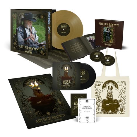 Das Bild zeigt verschiedene Alben und Merchandise von "Arthur Brown". Ein Vinyl, CDs, ein Buch und eine Tasche sind abgebildet.