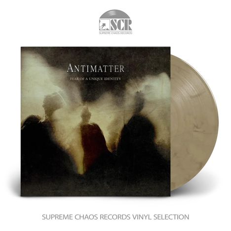 "ANTIMATTER - FEAR OF A UNIQUE IDENTITY" auf einem düsteren Albumcover mit schemenhaften Figuren in Rauch.