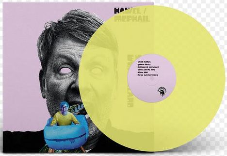 Text: "MANUEL MEPHAIL" und eine Trackliste.  
Illustration: Schwarz-weißes Gesicht, gelbe Vinyl, Person im blauen Sitz.