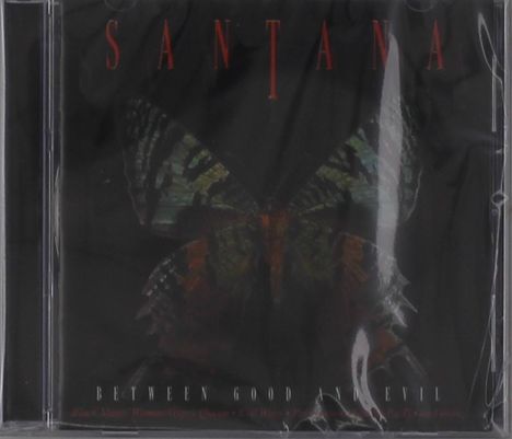 SANTANA oben in Rot, BETWEEN GOOD AND EVIL unten in Weiß. Ein Schmetterling auf dunklem Hintergrund.