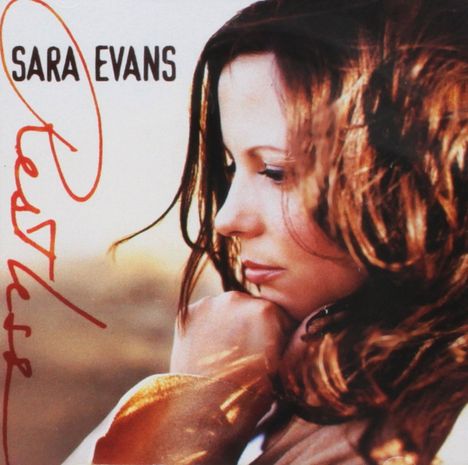 Text: "Sara Evans" in Schwarz, "Restless" in roter Schreibschrift. Eine Frau mit braunen Haaren, nachdenklich zur Seite blickend.