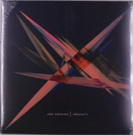 Text: "Jon Hopkins | Immunity". Abstrakte Grafik mit bunten, überkreuzten Linien auf dunklem Hintergrund.