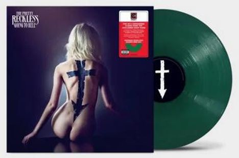 Text: "The Pretty Reckless - Going to Hell". Grüne Schallplatte mit einem Pfeilkreuz. Frau mit einem Kreuz aus schwarzem Klebeband auf dem Rücken.