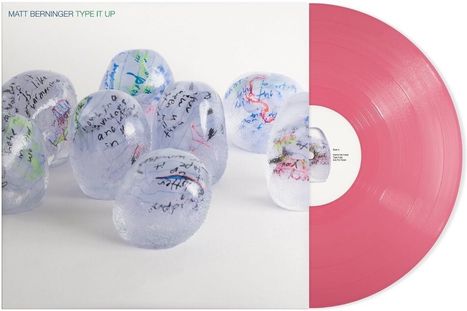 Der Text "Matt Berninger Type It Up" erscheint oben. Daneben liegen beschriftete, eisartige Kugeln und eine pinke Schallplatte.