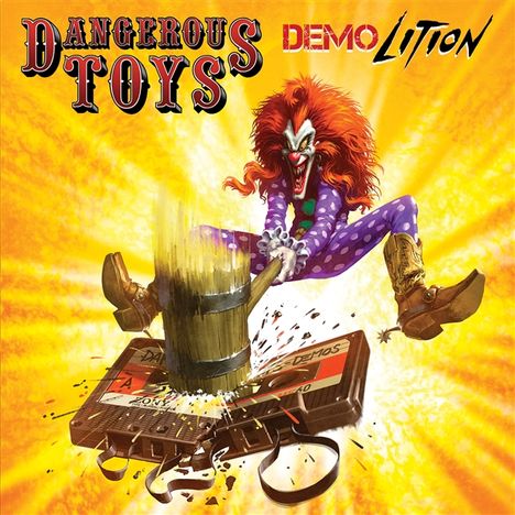 "Dangerous Toys", "Demo Lition". Illustration: Ein Clown zerschlägt mit einem Hammer eine Kassette, gelber Hintergrund.