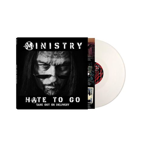 „MINISTRY“ oben, „HATE TO GO“ darunter. Porträt eines Mannes mit Sonnenbrille in Schwarz-Weiß. Vinyl-Schallplatte sichtbar.