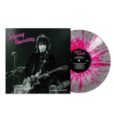„Johnny Thunders“ in pinker Schrift. „Madrid Memory“ unten. Schallplatte mit pinken Spritzern.