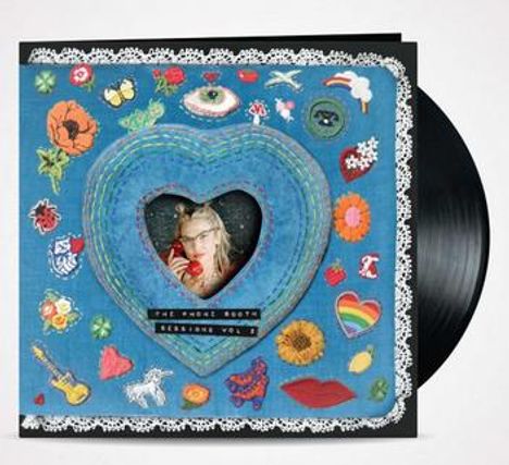 "THE PHONE BOOTH SESSIONS VOL. 1". Eine Schallplatte mit einem bunten Cover voller dekorativer Symbole und Stickereien.