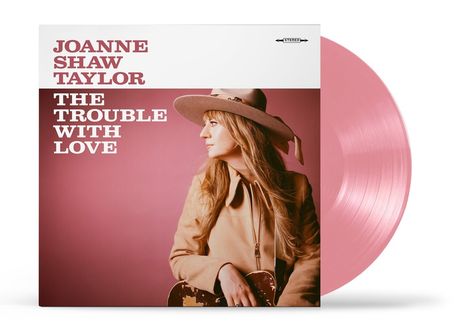 Texte: "JOANNE SHAW TAYLOR", "THE TROUBLE WITH LOVE". Frau mit Hut, Gitarre im rosa Vinyl-Design.
