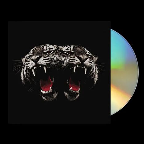 Zwei brüllende Tigerköpfe auf schwarzem Hintergrund, daneben eine schimmernde CD.