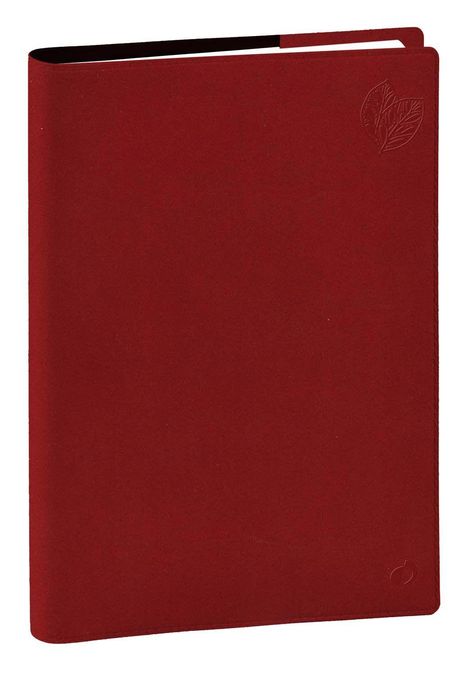 Ein rotes Notizbuch mit einem geprägten Blatt-Design in der oberen rechten Ecke.