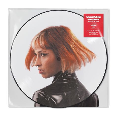Text: "SUZANE - MILLENIUM - NOUVEL ALBUM." Frau mit orangeblondem, kinnlangem Haar in schwarzem Outfit.
