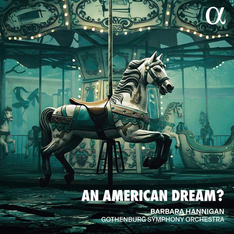 "AN AMERICAN DREAM? Barbara Hannigan, Gothenburg Symphony Orchestra". Ein Karussellpferd im Vordergrund, nostalgische Atmosphäre.