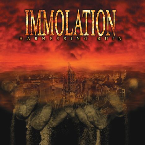 Text: "IMMOLATION HARNESSING RUIN". Szene: Stadt in großen Händen, vor einem dramatischen roten Himmel.