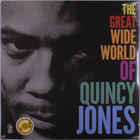 Text: "THE GREAT WIDE WORLD OF QUINCY JONES". Schwarz-Weiß-Foto eines ernsten Gesichts, bunte Schrift.