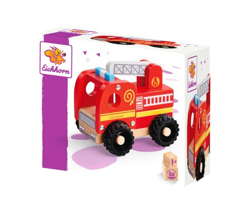 Text "Eichhorn", "Fire Engine", "1+". Bunte Verpackung mit rotem Holz-Feuerwehrauto, Eichhörnchen-Logo und violetten Akzenten.